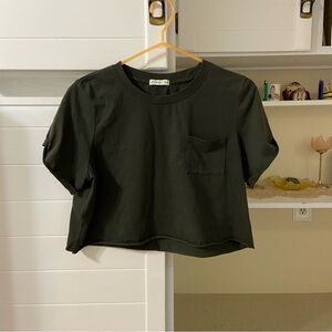 Green cropped tee with pocket detail